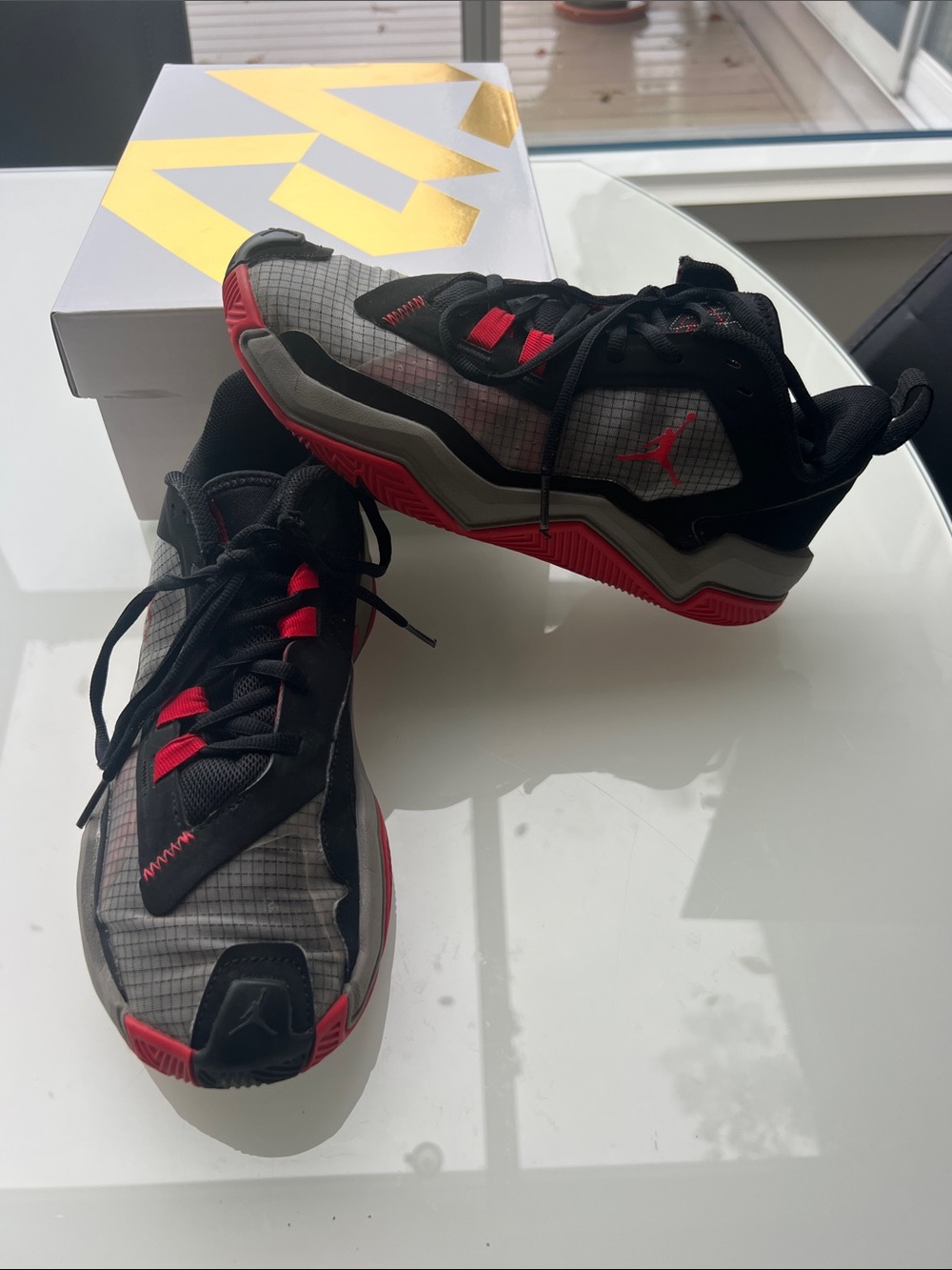 Jordan Low-Top Sneakers in Black, Red, and Gray